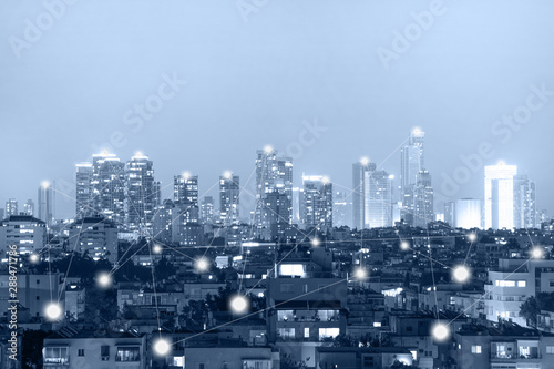 Communication network concept 5G smart city on blue background. Modern city with wireless network connection concept. Blue tone city scape and network connection concept.             