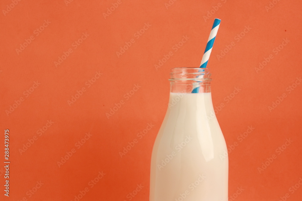 glass bottle with delicious milk.. glass bottle with delicious milk..