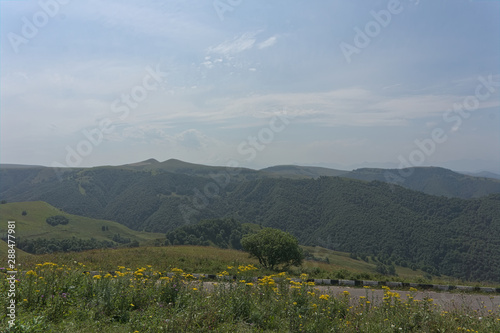 Gumbashi pass view in the russian caucasus, green meadow landscape at an altitude of above 2000 m