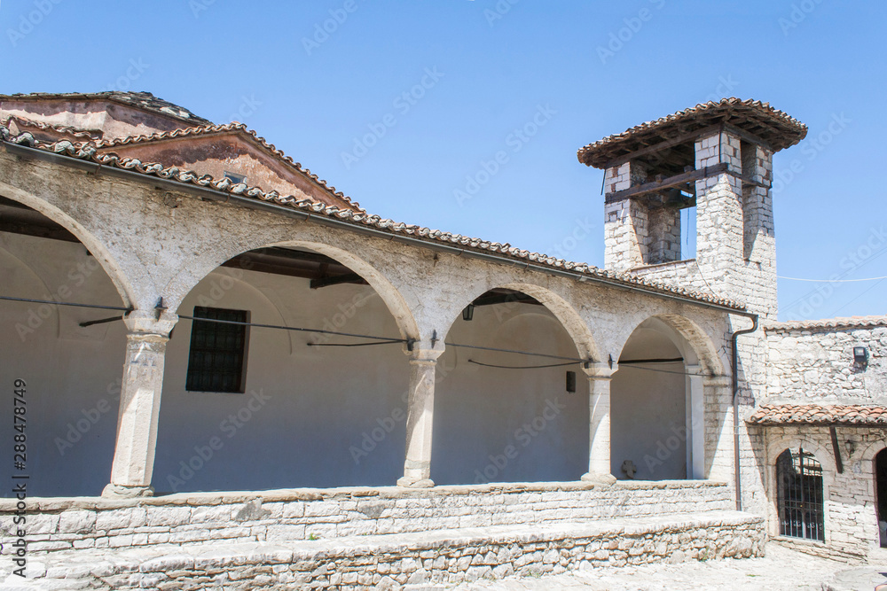 Fototapeta premium street in old town stone courtyard in Berat Fortress, Albania, Balkans