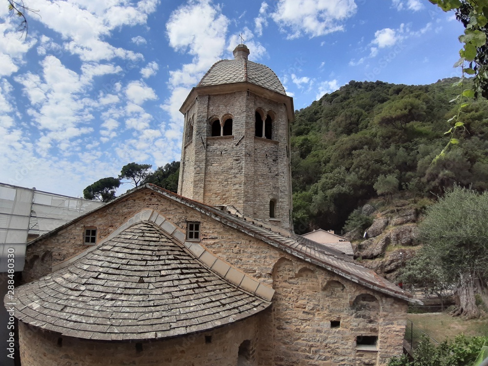 Portofino, Italy - 08/29/2019: Beautiful bay with colorful houses in Portofino in sumer days. Hiking around the ligurian mountains.