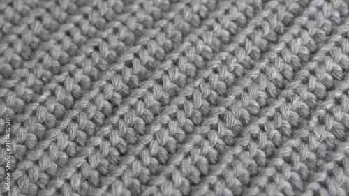 Wallpaper Mural Wool background. Grey wool clothes texture closeup, dolly shot. Knitted soft gray merino wool macro shot. Natural woolen fabric. 4K UHD video footage. 3840X2160 Torontodigital.ca