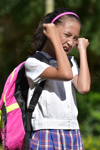 An Angry Female Student With Notebooks