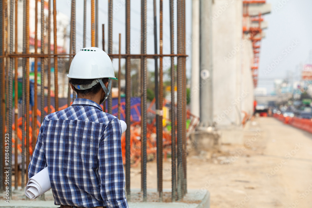 workers supervising construction of electric vehicles are looking to plan for construction workers supervising construction of electric vehicles are looking to plan for construction