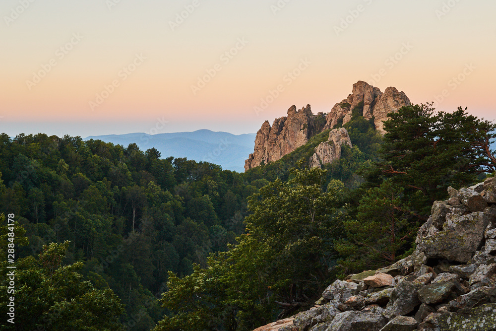 Naklejka premium Sunrise in mountains, natural background.
