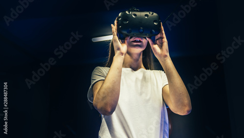 Woman with glasses of virtual reality. Future technology concept.