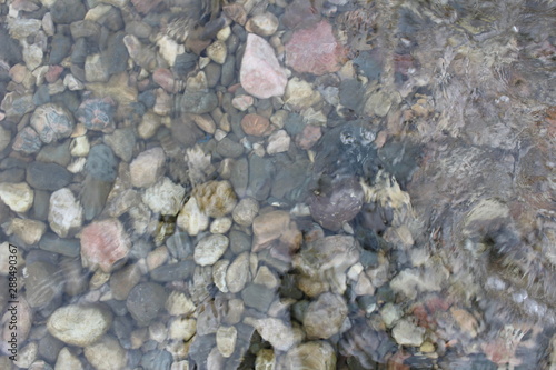 water Flowing Over Smooth Stones © fahim21