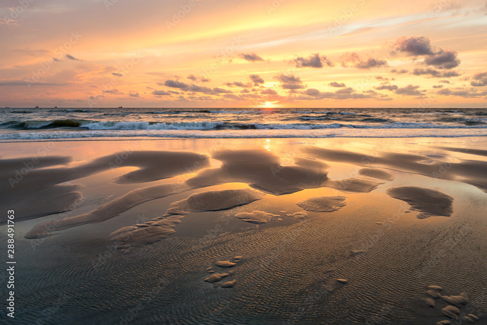 sunset at the Dutch North Sea coast near Katwijk aan Zee