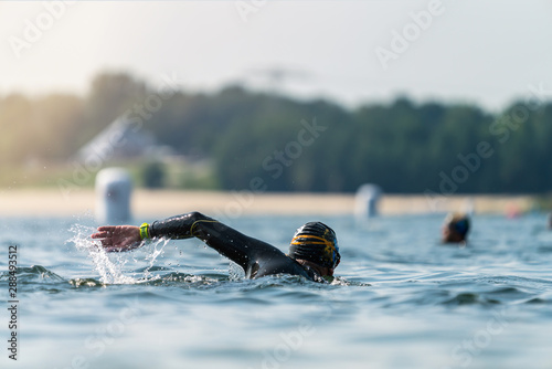 Obraz na płótnie Athlete swimming at a triathlon