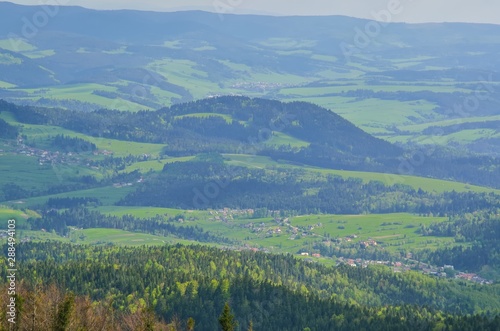 Fototapeta Naklejka Na Ścianę i Meble -  Beautiful mountain spring landscape. Picturesque valley and green hills.
