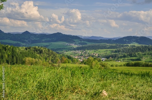 Beautiful spring green landscape. View of the charming villages in the mountains.