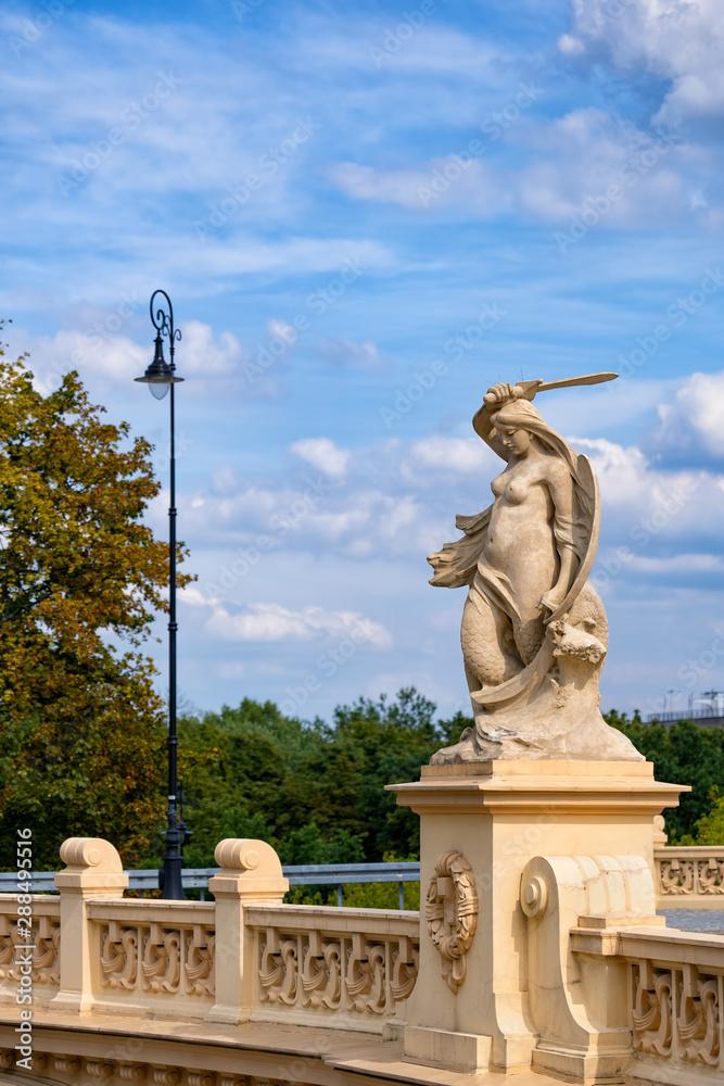 Fototapeta premium Mermaid Sculpture on Markiewicz Viaduct in Warsaw