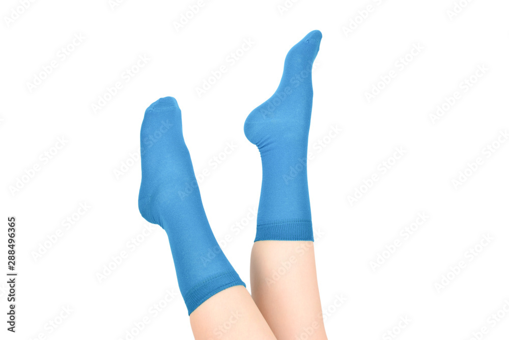 Woman in blue socks isolated on white background. Top view. Woman in blue socks isolated on white background. Top view.