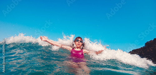 Girl swimming in the sea