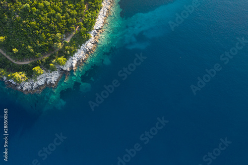 Aerial view of sea waves and fantastic Rocky coast, Montenegro © yursavieno