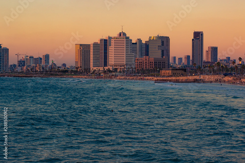 Tel Aviv capital of Israel modern city beautiful evening sunset landscape and landmark skyscraper urban district view on Mediterranean sea beach waterfront 