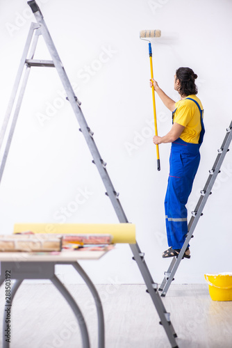 Young man contractor doing renovation at home