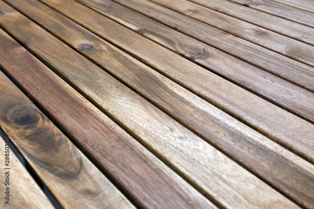 Fototapeta premium Wooden lumber table surface for a garden, bright texture
