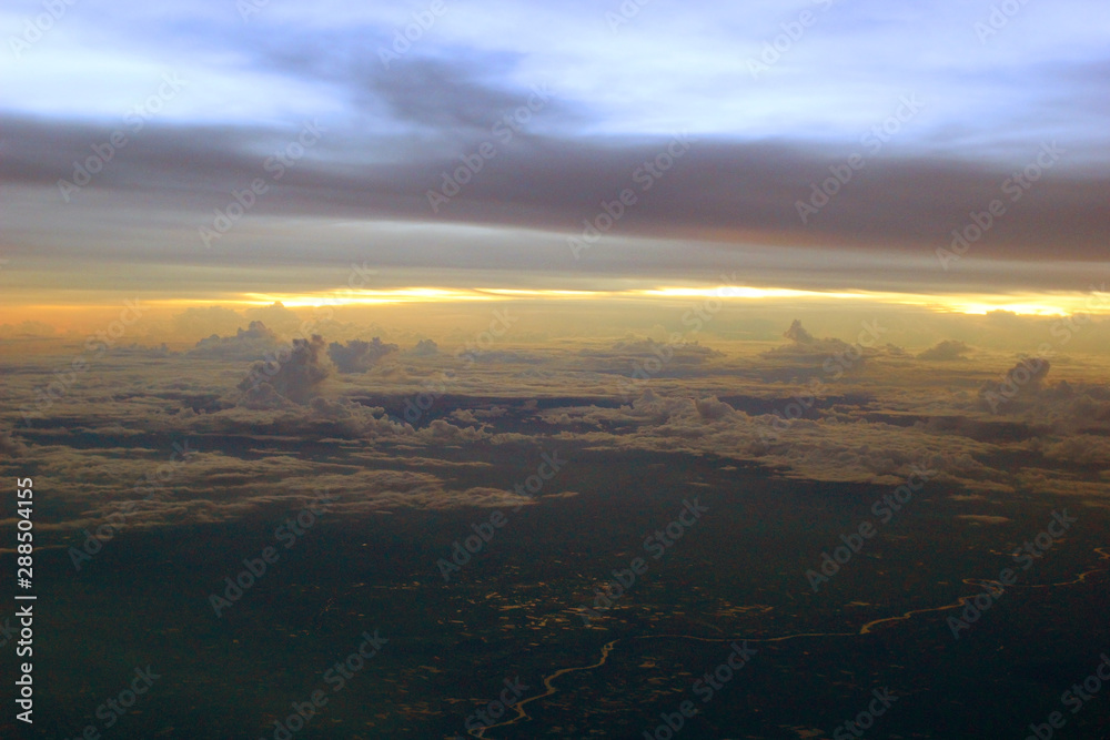 sunrise view from the window of an airplane