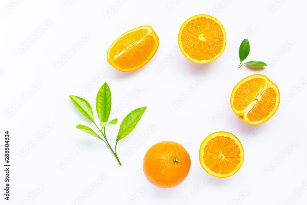 Fresh orange citrus fruit with leaves isolated on white background.