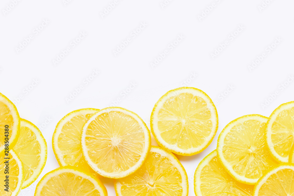 Frame made of fresh lemon with slices on white background. Frame made of fresh lemon with slices on white background.