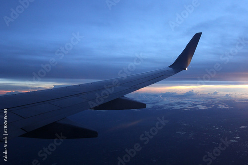 aircraft wing flying over beautiful clouds