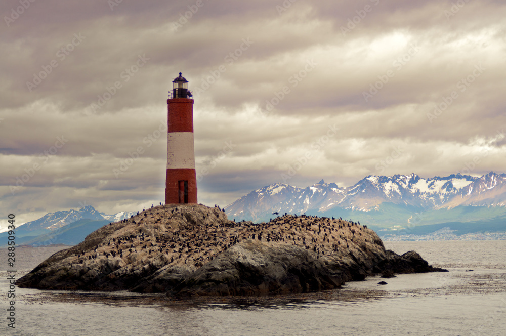 Les Eclaireurs Light House on rocky island on the Beagle Channel, Ushuaia, Argentina