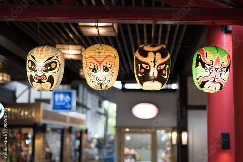 JAPANESE KABUKI NOH Mask lamp in dark background photo