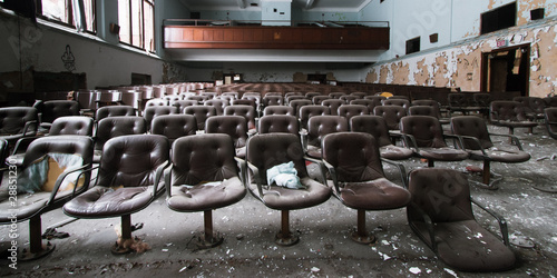 Tela Chairs of the auditorium remains of an abandoned Detroit high school