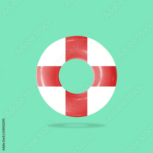 Lifebuoy for helping people in the water isolated on pastels color background, with clipping path.