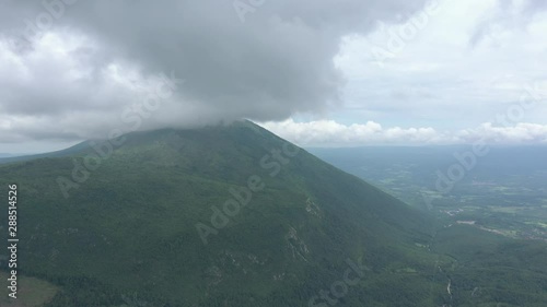 High above valley of Rtanj mountain 4K aerial video photo