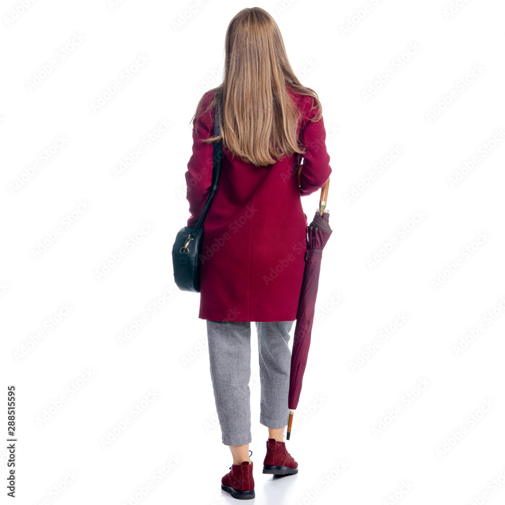 Woman in red coat and black bag, umbrella standing looking autumn on white background isolation, back view Woman in red coat and black bag, umbrella standing looking autumn on white background isolation, back view