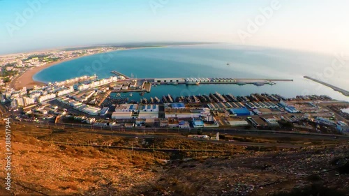 Port, on the shore of the ancient Casbah fortress in Morocco. Sunny day. Ocean.