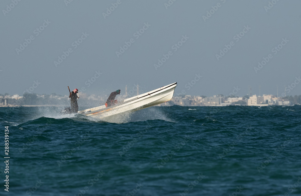 Fishermen in speed boat in the monring