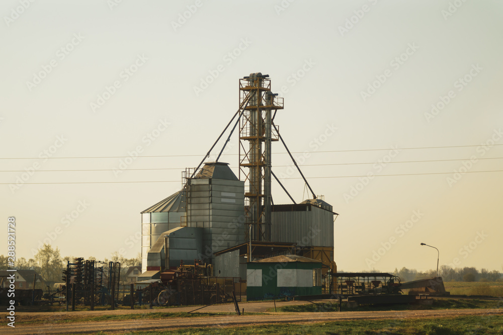 Grain store in the countryside. agriculture factory Grain store in the countryside. agriculture factory