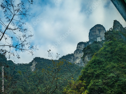 Beautiful view on the bus on tongtian road moving from tianmen mountain heaven gate cave on tianmen mountain national park at zhangjiajie city China.Tongtian Road the winding Road  99  curves road photo
