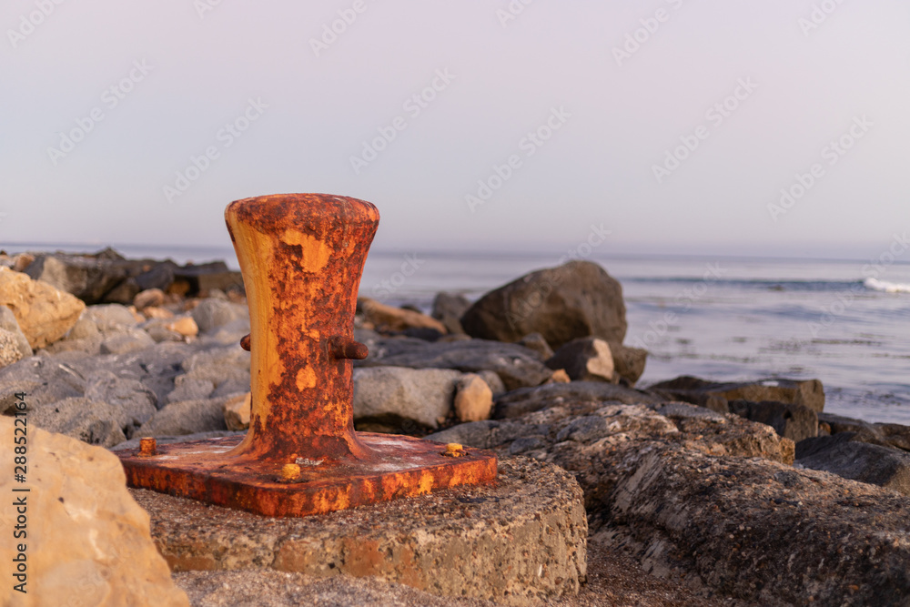 Fototapeta premium Rusty boat mooring on the beach
