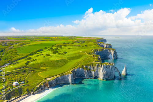 Picturesque panoramic landscape on the cliffs of Etretat. Natural amazing cliffs. Etretat, Normandy, France, La Manche or English Channel. Coast of the Pays de Caux area in sunny summer day. France photo