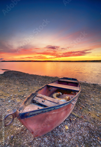 Fototapeta Naklejka Na Ścianę i Meble -  Beautiful summer sunset over water