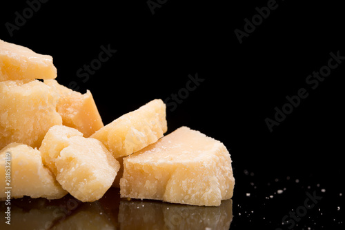 Tasty and fresh pieces of Parmesan cheese photo