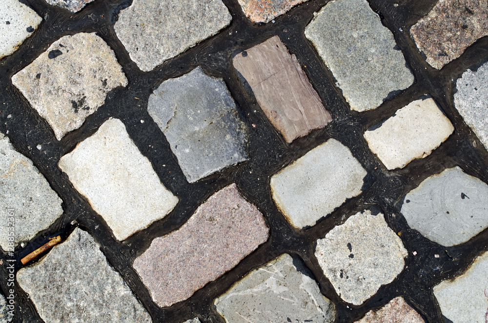 Obraz premium Close up view of cobblestone pavement