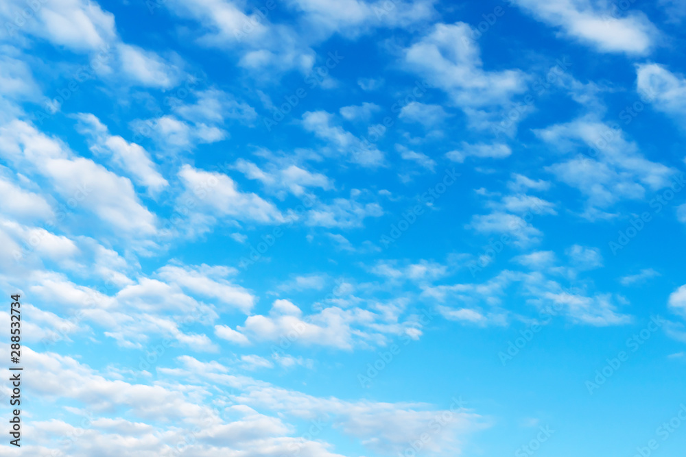 Fototapeta premium A huge blue sky with beautiful white clouds. Background.