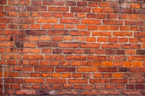 Red bricks wall background. Old building surface