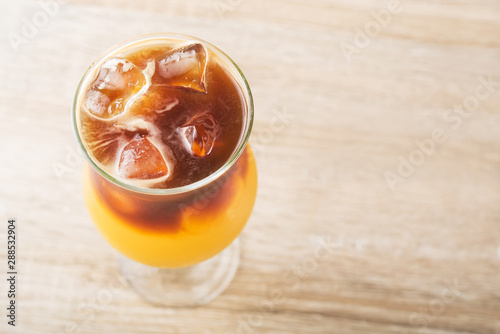 Cold summer caramel cocktail with ice