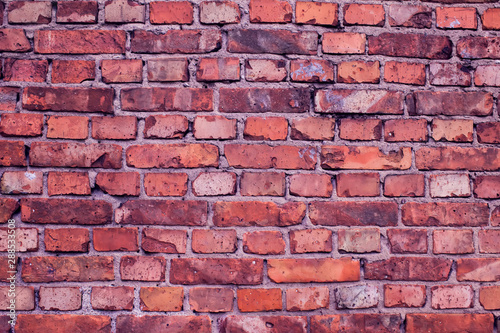 Red bricks wall background. Old building surface