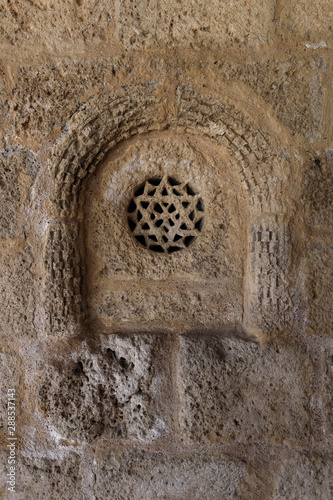 Mudejar rosette in the Romanesque church of San Bartolomé. Campisábalos (Guadalajara, Spain)