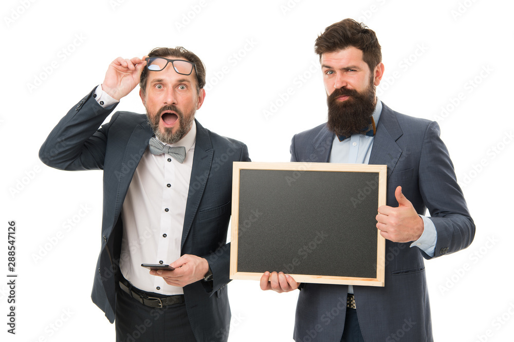 announcement. party invitation. businessmen use phone, copy space. bearded men hold advertisement blackboard. partners celebrate start up business isolated on white. welcome on board announcement