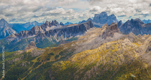 Panoramic view of Cinque Torri on a cloudy day with opening peaks of the Julian Alps  Dolomites  Italy