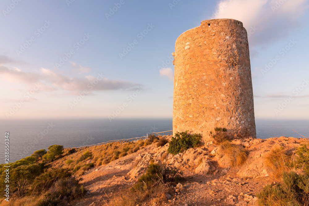 Cerro Gordo Watchtower at sunrise on the Costa Tropical of Granada (Spain)