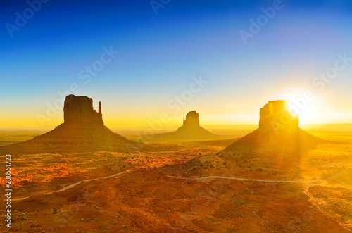 View of Monument Valley at sunrise near the border of Arizona and Utah in Navajo Nation Reservation in USA.